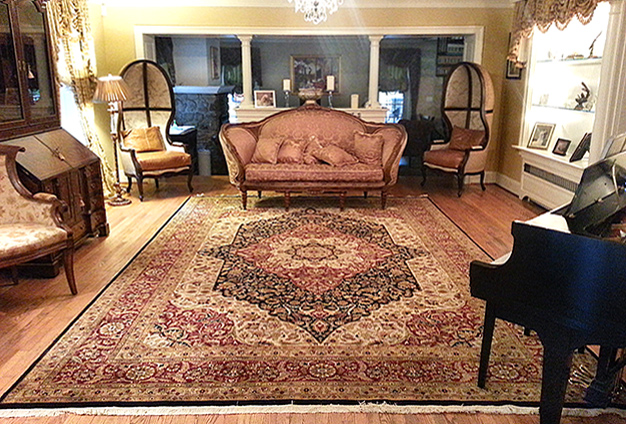 Well-balanced, stylishly appointed room with Nejad rug as centerpiece 