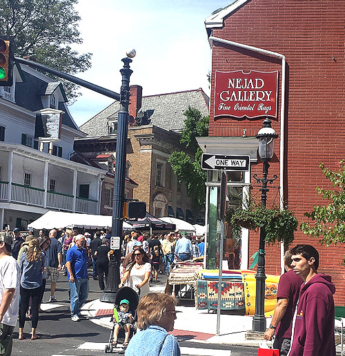 View of Nejad Rugs Gallery Showroom from E State Street facing N Main St