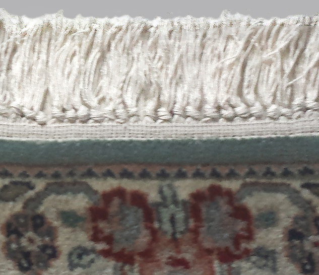 Detail view of rug fringe replacement by Nejad Rugs