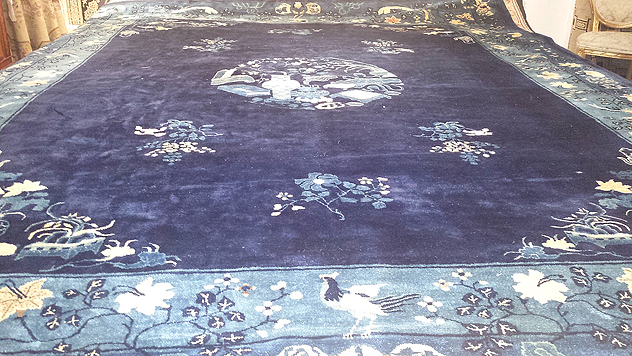 water-damaged antique oriental carpet (pictured)