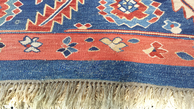Semi antique Kilim rug after repair