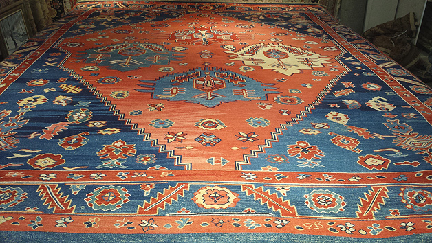 Full view of rug with undetectable repair by Nejad.