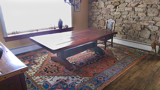 Nejad Heriz rug shown in Lehigh Valley dining room
