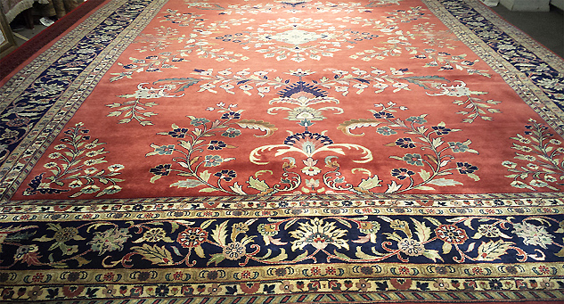 An elegant hand-knotted Persian Sarough rug from Nejad (pictured)