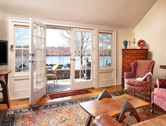 Example of furniture - table and chairs -overlapping oriental carpet