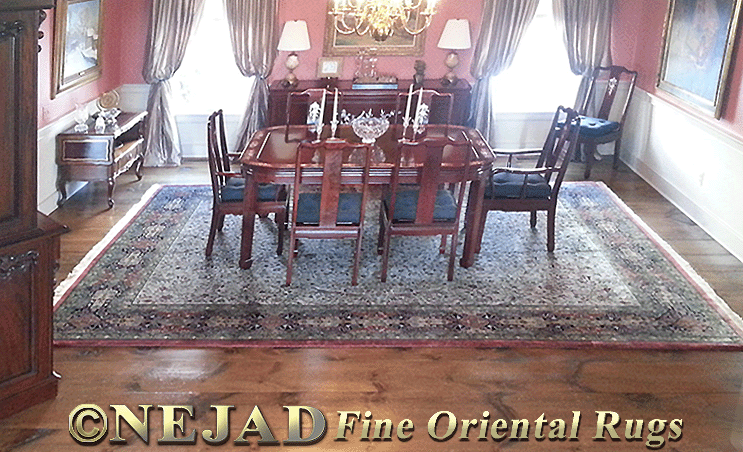 The Hunt Tabriz Rug 12 ft x 15 ft from the 
Nejad Signature Masterpiece Collection M013 
(Ivory - Navy - Emerald) This room size fine 
hand-knotted rug with all-over design features 
stately elegance and provides perfect 
atmosphere to show formal and realistic 
artwork such as Portrait and History Painting.