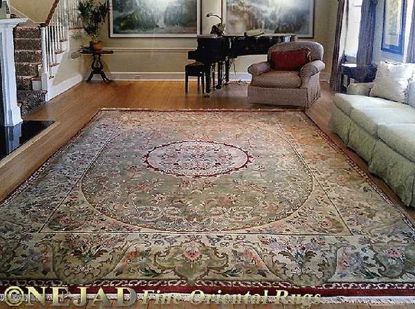 Large M001 Sage Gold Elegant Savonnerie 
rug inspired by 17th and 18th century 
classical French design featured in 
Nejad client living room.  
For more information about this rug