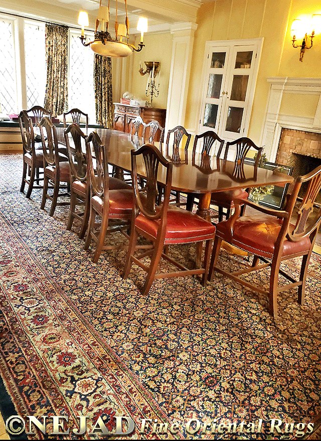 Room setting featuring Nejad's Antique Persian Fereghan 
Sarouk Rug in Philadelphia Stone House Formal Dining Room