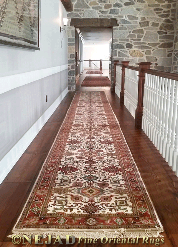 Long hallway in PA estate home fitted with a compliment of elegant rug runners