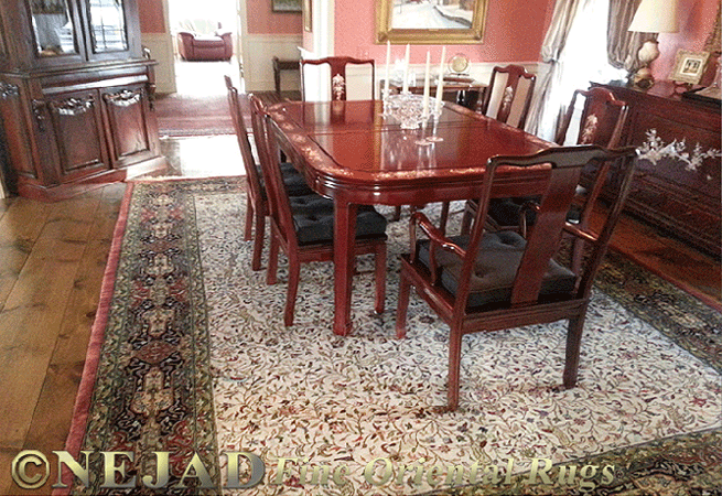 Nejad's Elegant Hunt Tabriz Rug is the Perfect Fit for this Dining Area