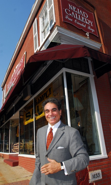 Ali Nejad, president and founder of Nejad Rugs, in front
of Nejad Gallery rug showroom in the center of Doylestown