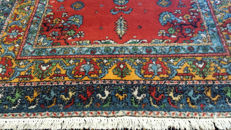Area rug restored to like-new condition.