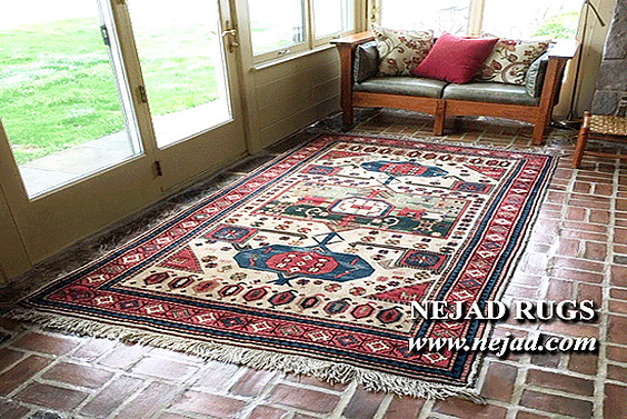 Nejad rug on brick tile floor