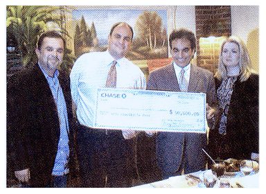 R to L: Theresa & Ali Nejad of Nejad Rugs, ORIA President Andrew Peykar, and Past President of ORIA Mikel Banilevi.