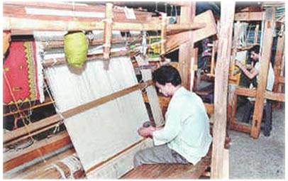 From am article in a New Delhi newspaper 
stating that Vinod Nair has devised a horizontal carpet loom