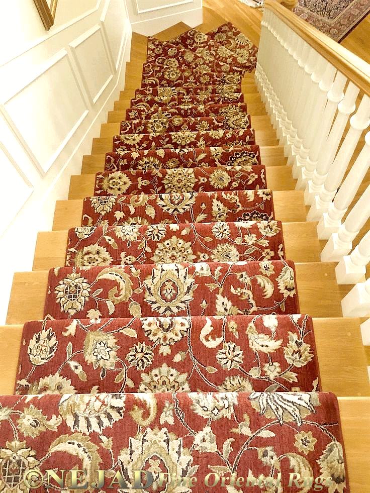 Rug runner installation on stairs and landing in elegant Philadelphia area estate home