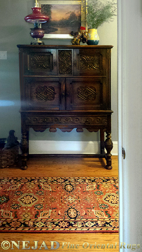 Hallway rug runner on natural wood floor provides a perfect accent.