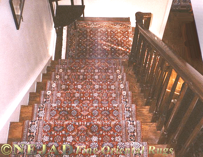 Runner installed on wooden staircase provides a perfect accent.